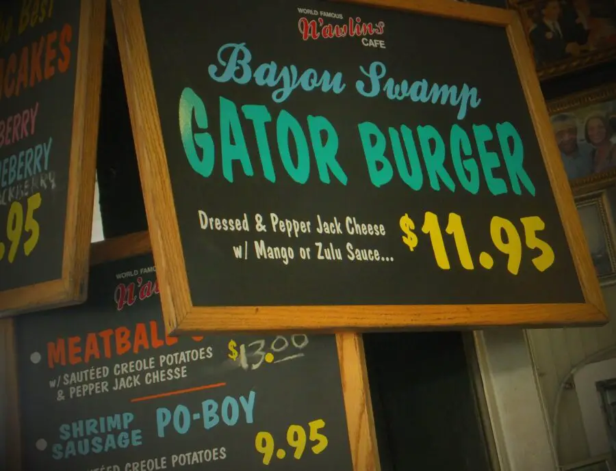 A sign of New Orleans food, including a Gator Burger and Po-Boy, at a New Orleans Restaurant