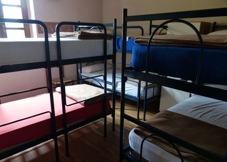 3 empty bunk beds in a hostel, an idea of one of the places to work on Worldpackers