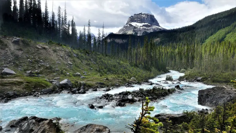 Wapta Mountain and a clear blue river in Yoho National Park - One of the stops on the drive from Calgary to Vancouver