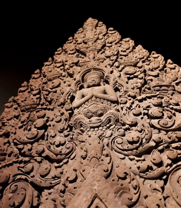 A detailed carved stone Khmer artifact in the Angkor National Museum, one of the best things to do in Siem Reap