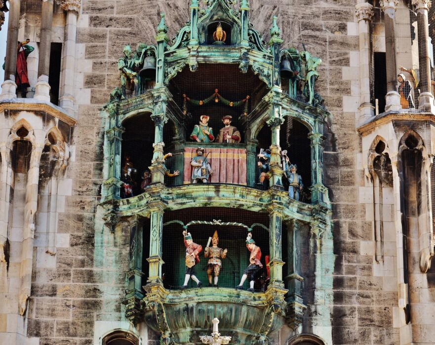 A close-up of the turquoise Glockenspiel show on the exterior of the New Town Hall in Munich
