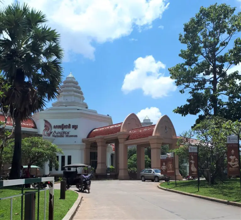 The white and red exterior of the Angkor National Museum in Siem Reap Cambodia on a sunny day
