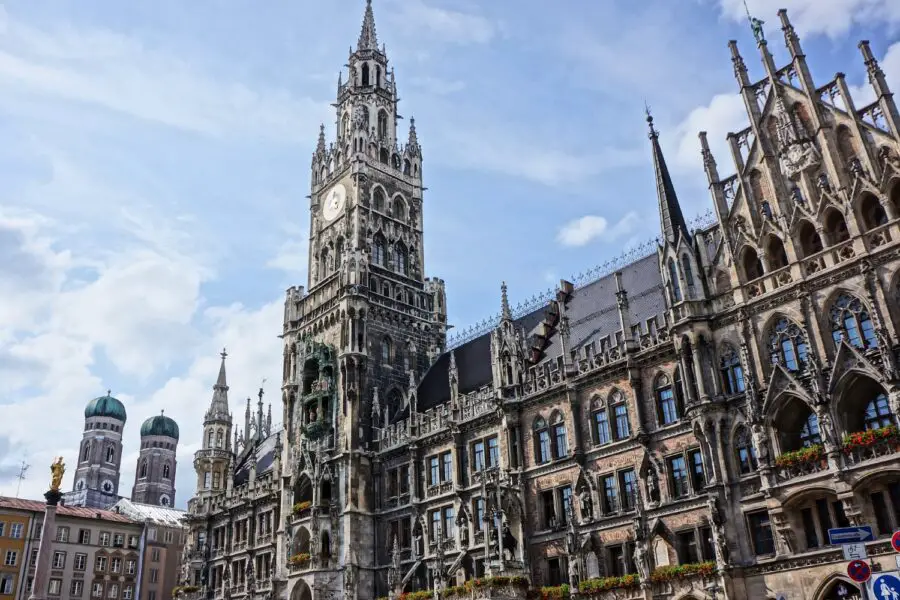 The exterior grey architecture of the Neues Rathaus Munich on a bright day