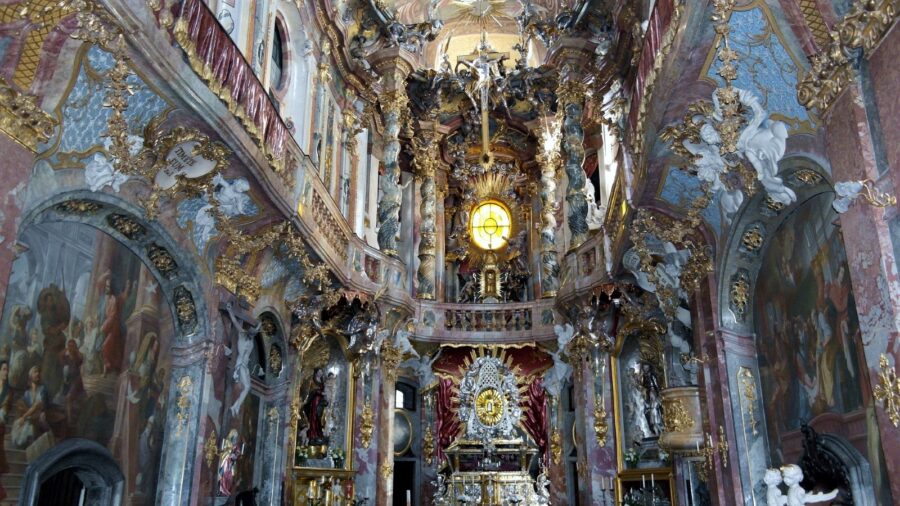 The opulent, colorful, and unique architecture of the interior of Asamkirche in Munchen