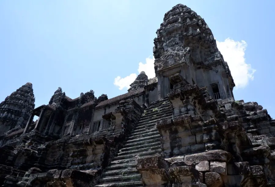 The towering stone temple in Angkor Wat on a bright day - the first stop on any Angkor Wat itinerary